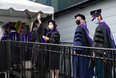 law graduates line up at 2021 commencement
