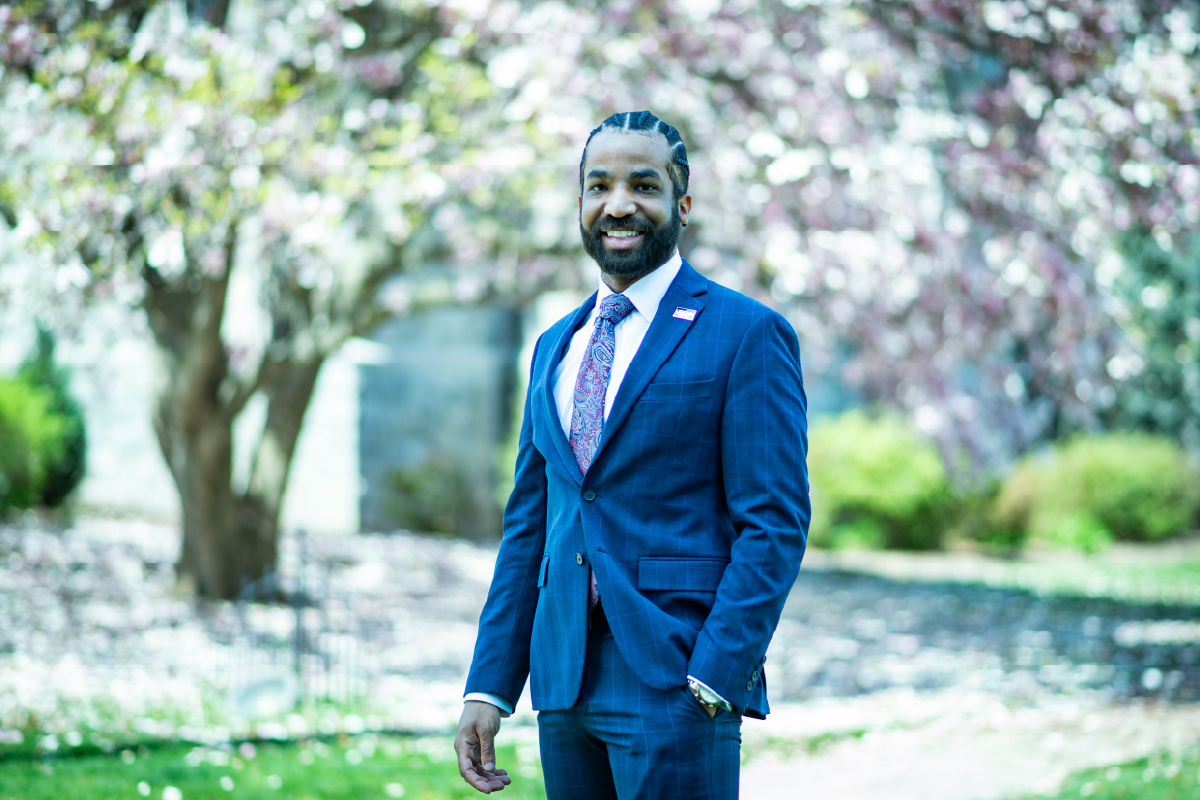 Brice Ashford in front of magnolia tree at UConn law campus