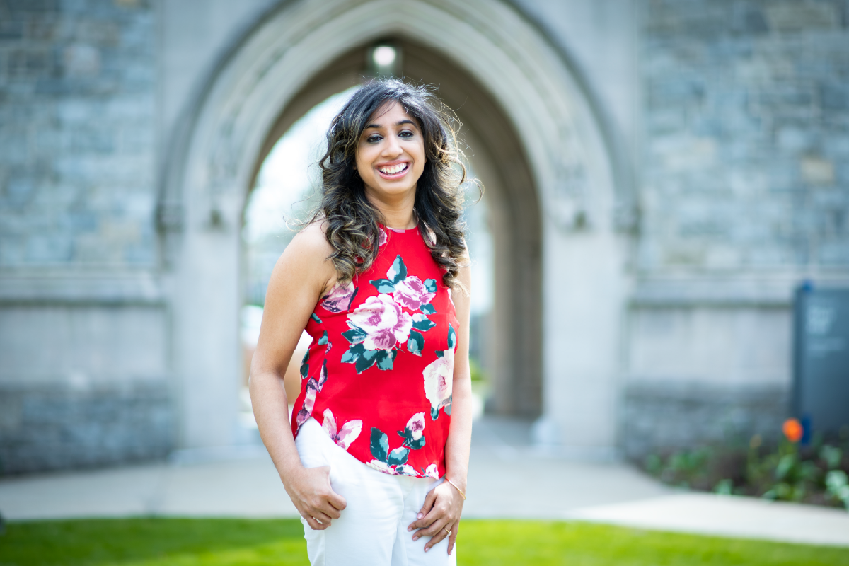 Sarina Bhargava in front of UConn Law School campus