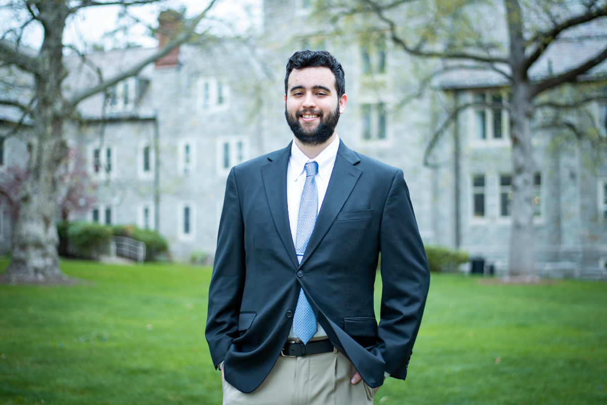 Sebastian Torres standing in front of UConn Law building